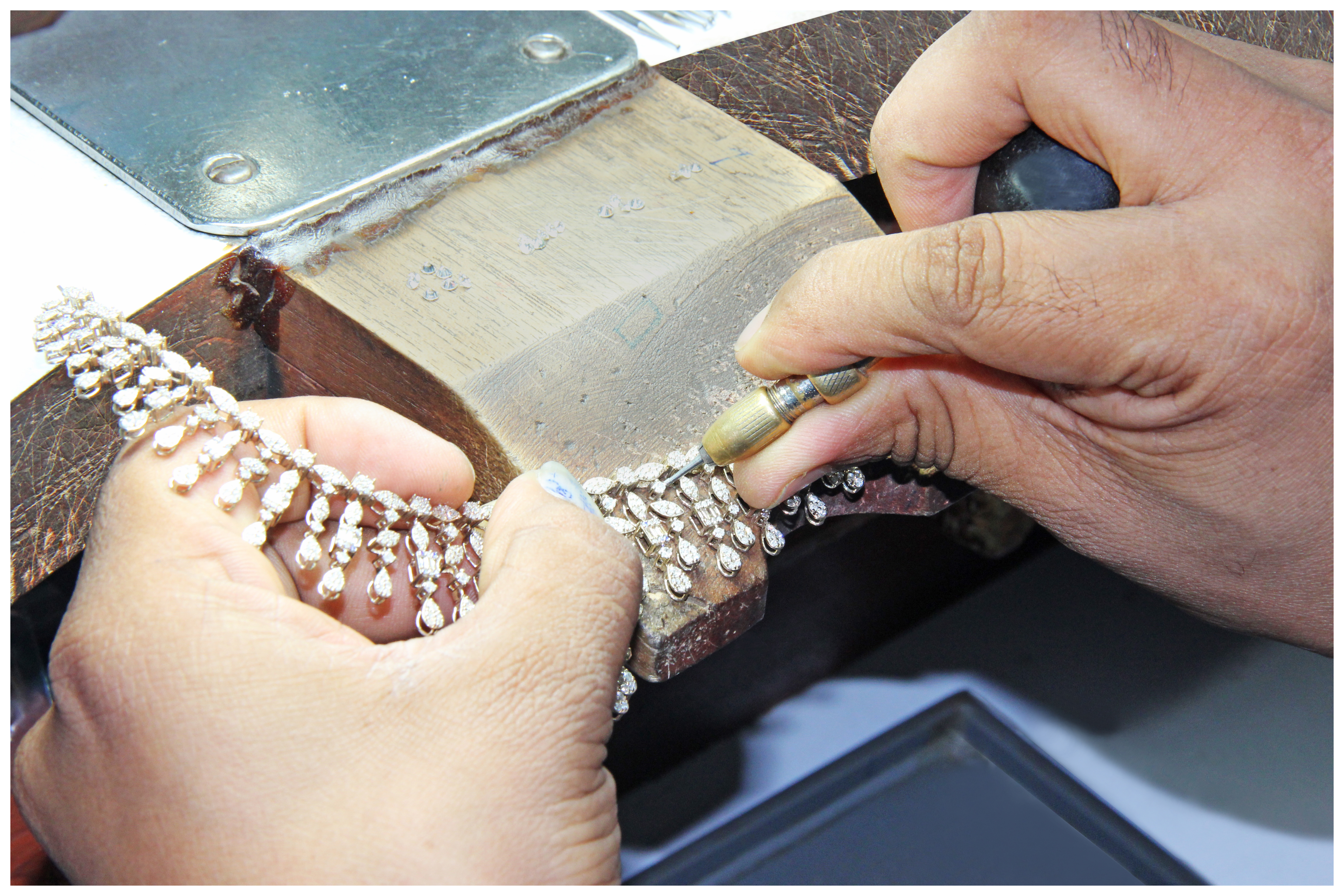 Hand setting diamonds